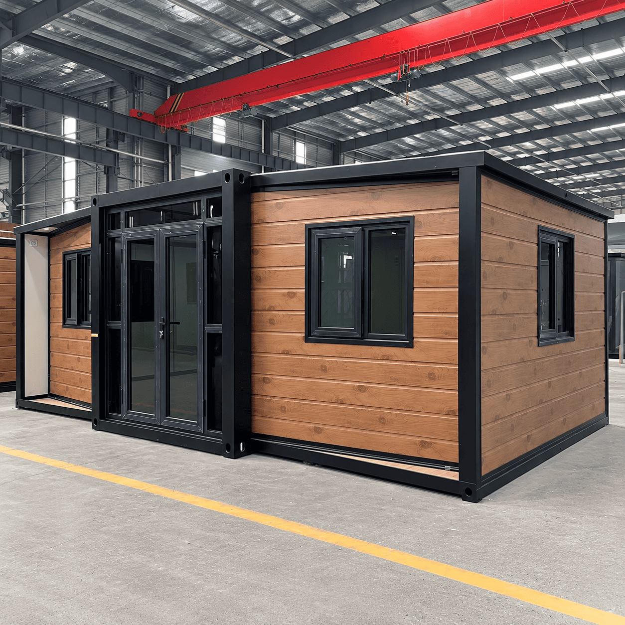 Casa Box 15ft erweiterbares Containerhaus | Fertighaus mit schwarzem Rahmen und Holzmaserung